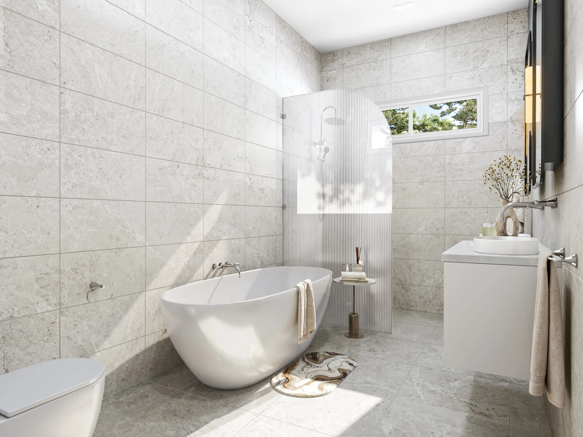 Bathroom with a freestanding bath and large stone-look tiles